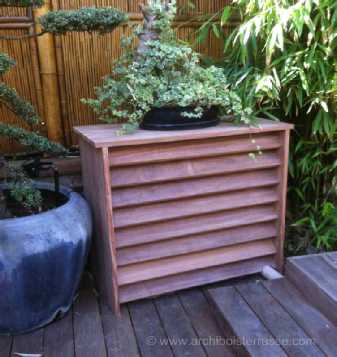 habillage en bois PAC ou clim de maison