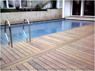 terrasse de piscine rehabilitee avec du bois exotique sceau